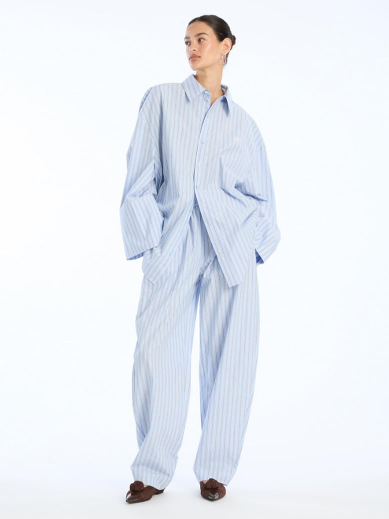 striped-pattern tapered trousers by Selfnex