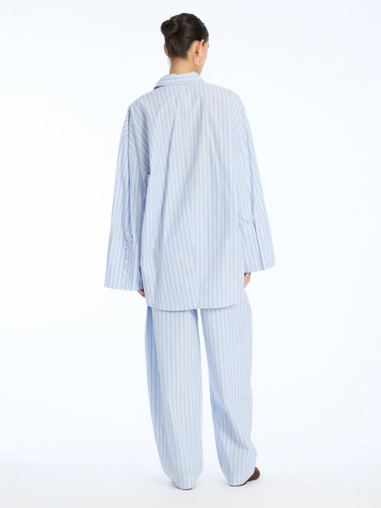 striped-pattern tapered trousers by Selfnex