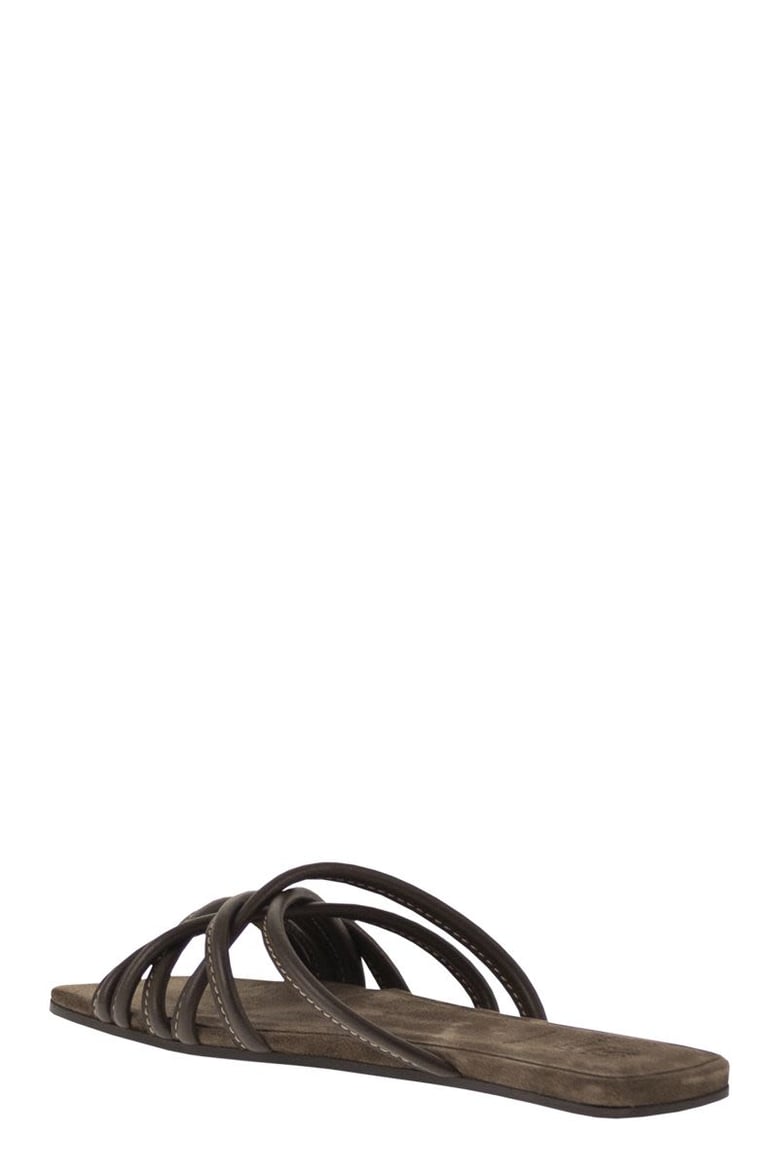 flat leather sandals with criss-cross straps by Selfnex