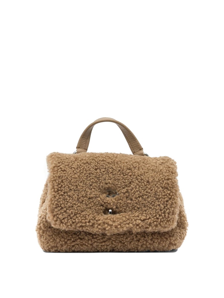 brown fabric handbag by Selfnex