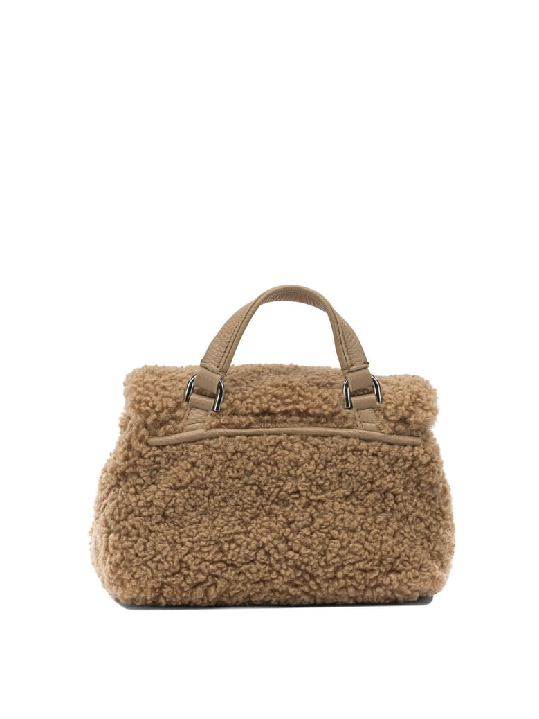 brown fabric handbag by Selfnex
