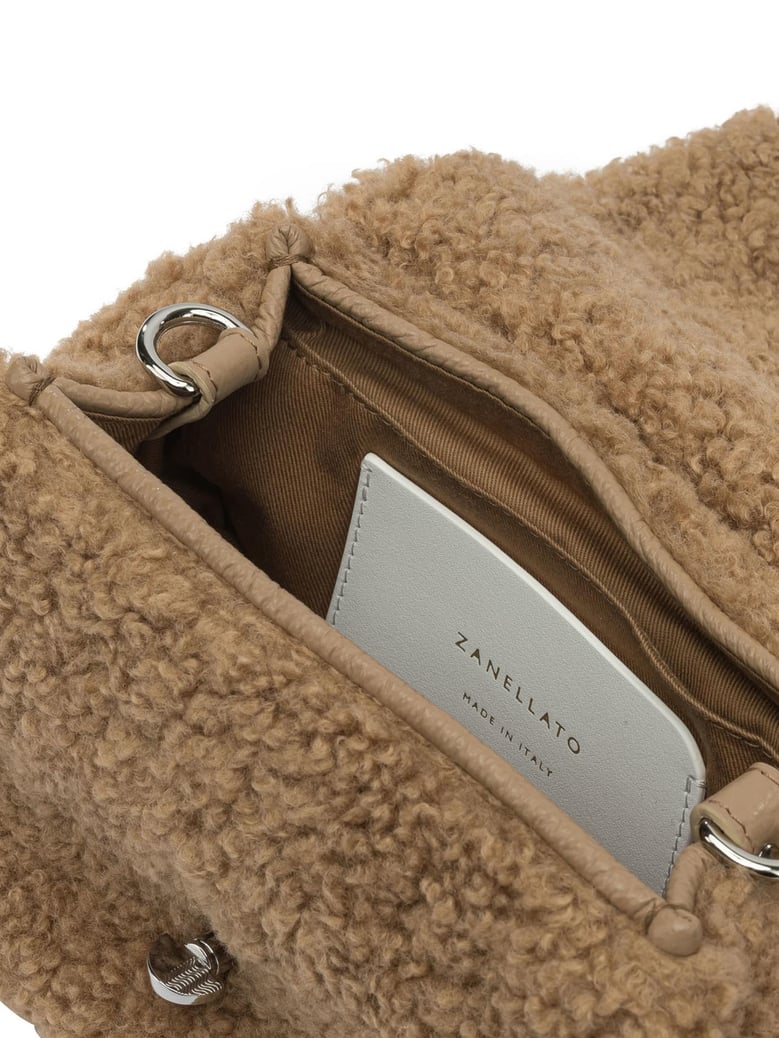 brown fabric handbag by Selfnex