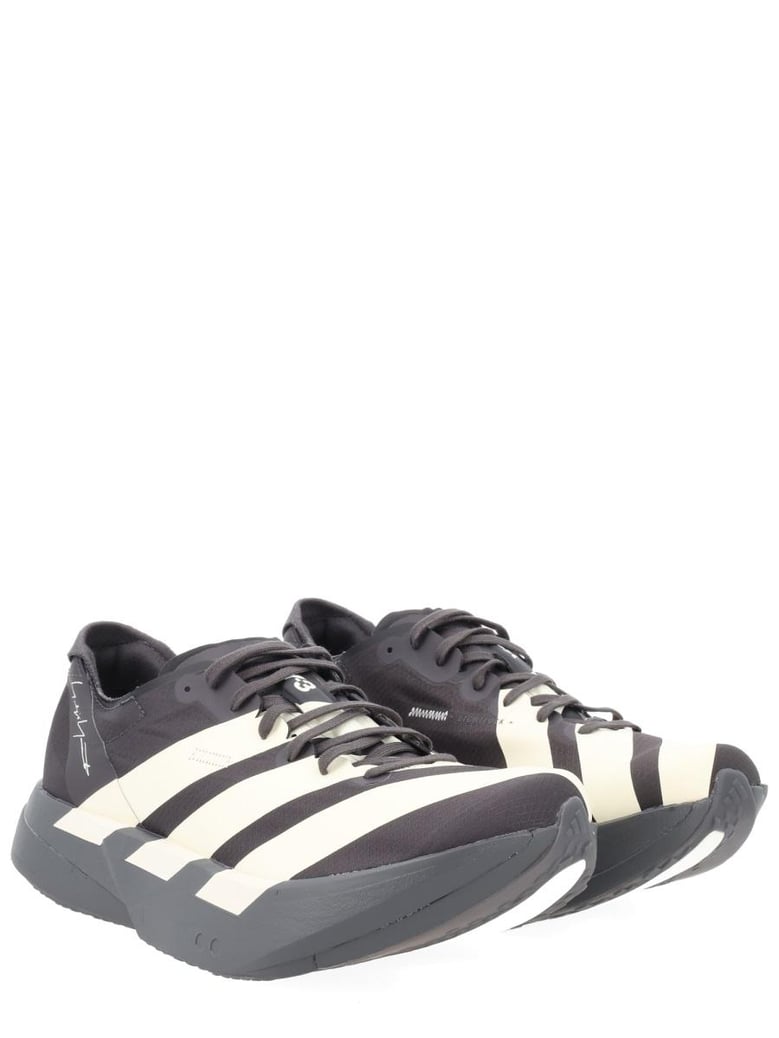 black synthetic sneakers by Selfnex