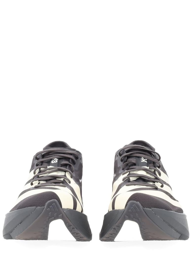 black synthetic sneakers by Selfnex