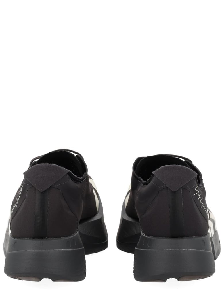 black synthetic sneakers by Selfnex