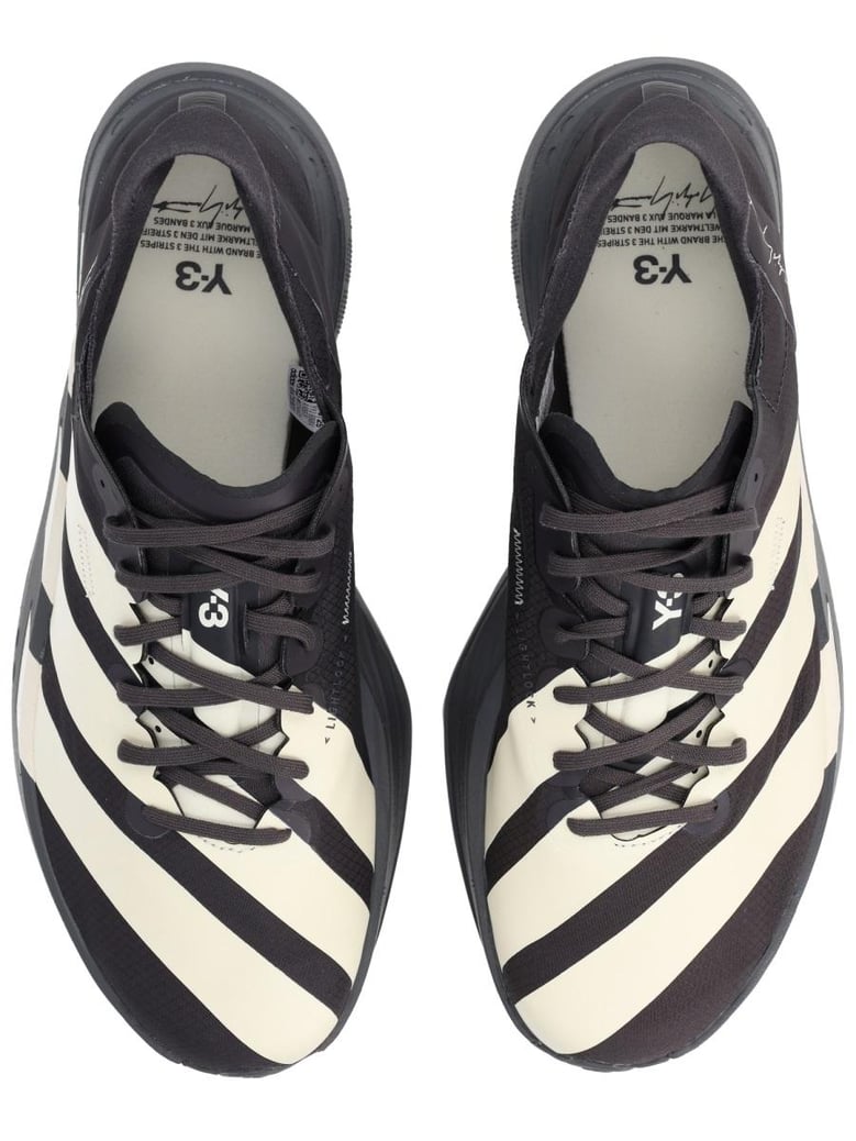 black synthetic sneakers by Selfnex