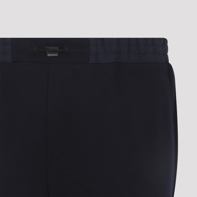 navy blue jersey virgin wool jogger pants by Selfnex