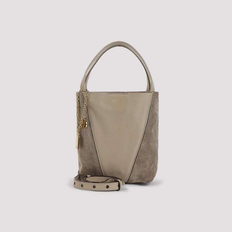 boyish brown buffalo leather spin bag by Selfnex