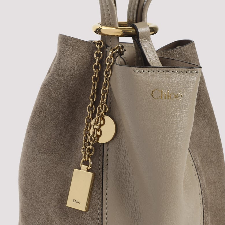 boyish brown buffalo leather spin bag by Selfnex