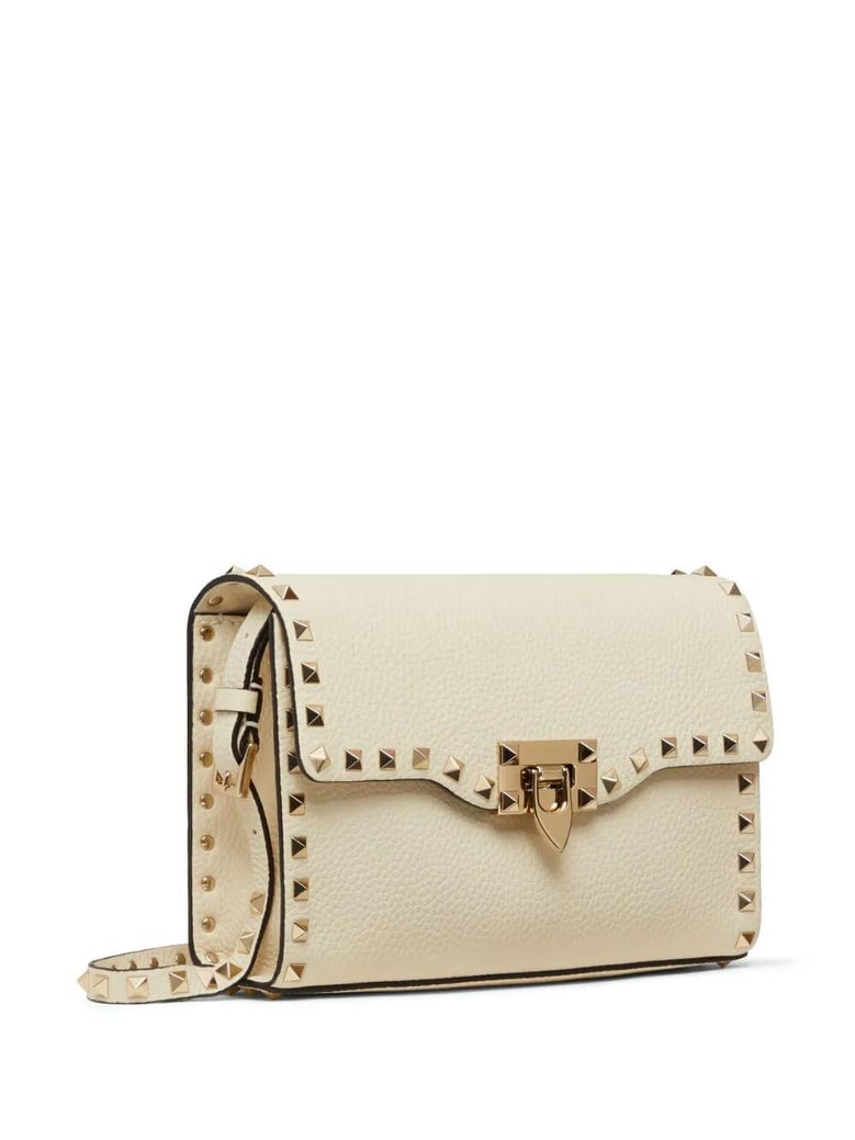 rockstud small garnet calfskin crossbody bag by Selfnex