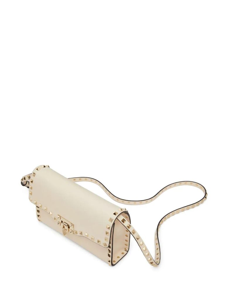 rockstud small garnet calfskin crossbody bag by Selfnex