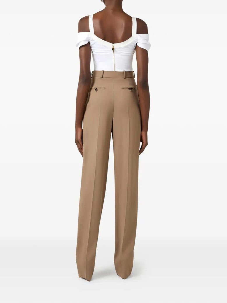 dart-detail gabardine trousers by Selfnex