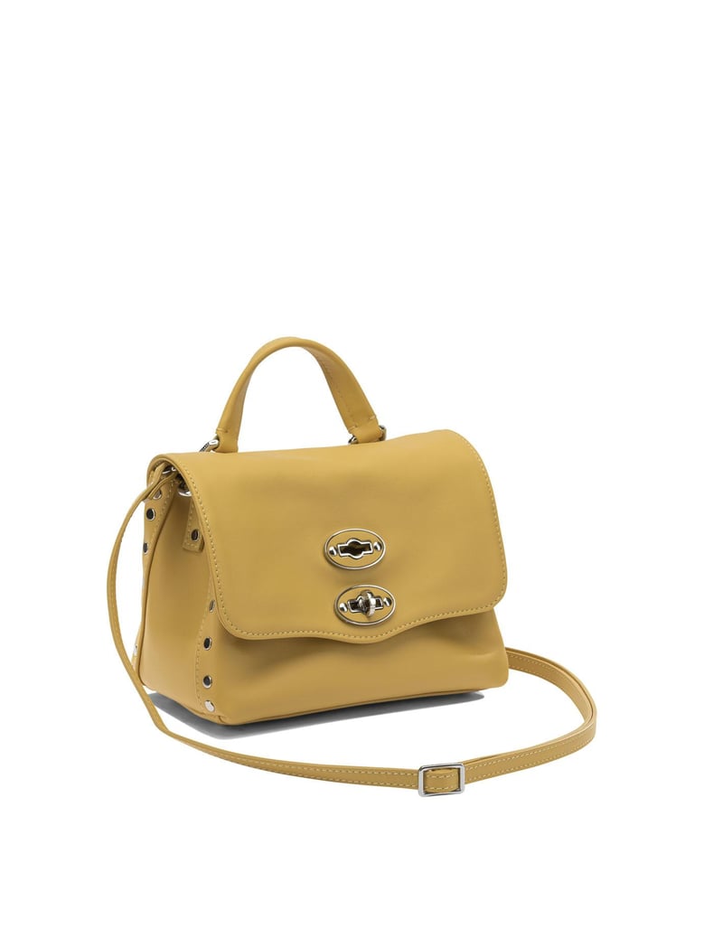 yellow leather handbag by Selfnex
