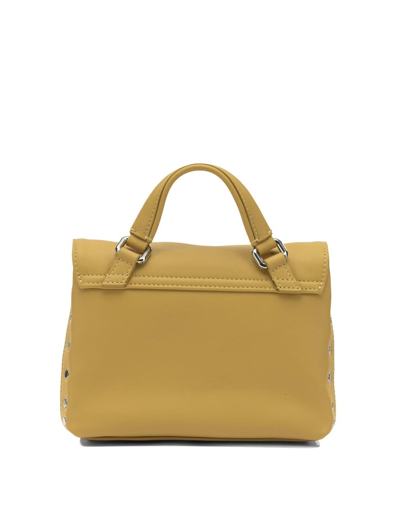 yellow leather handbag by Selfnex