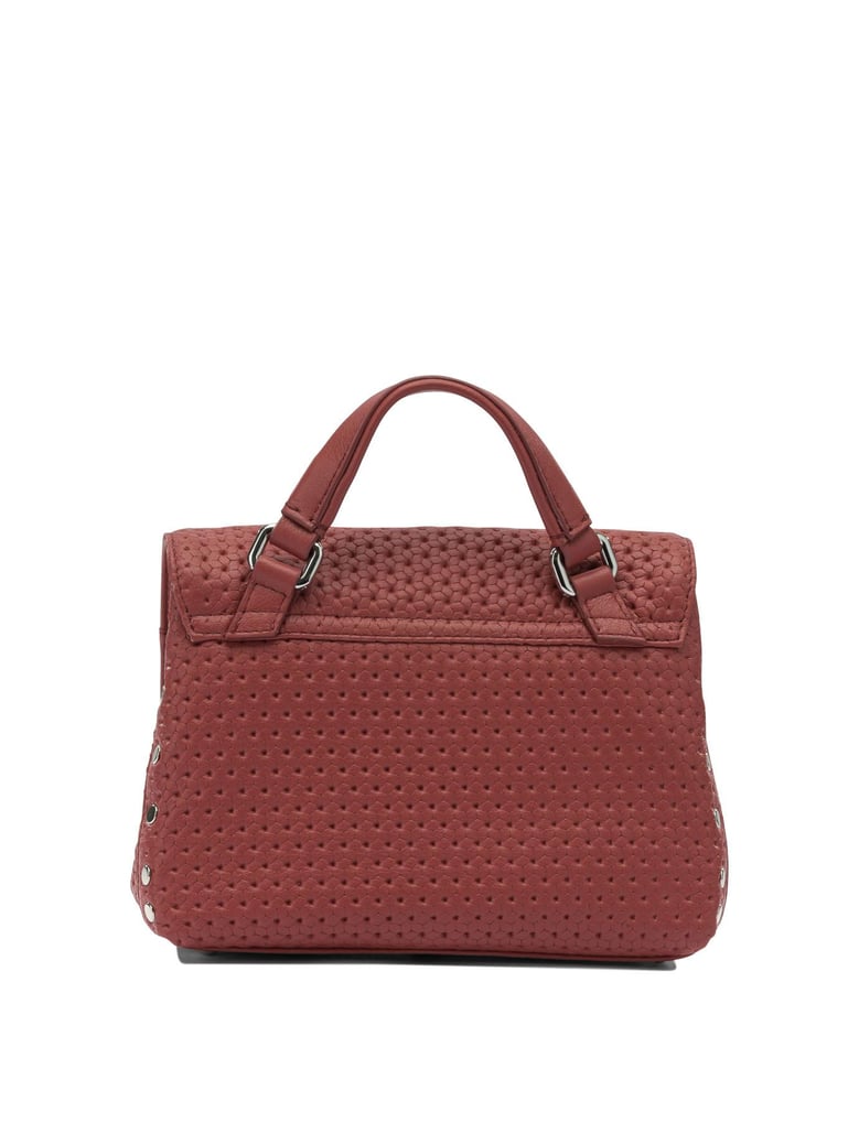 red leather handbag by Selfnex