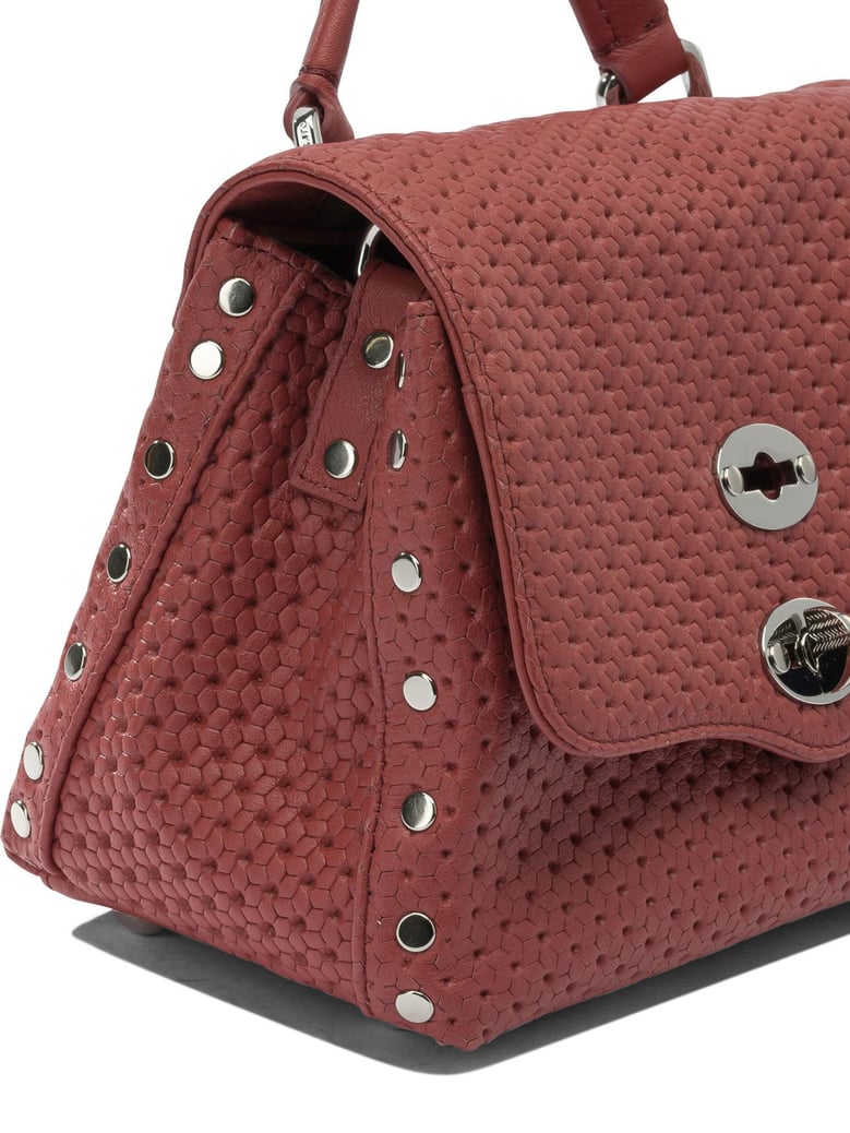 red leather handbag by Selfnex