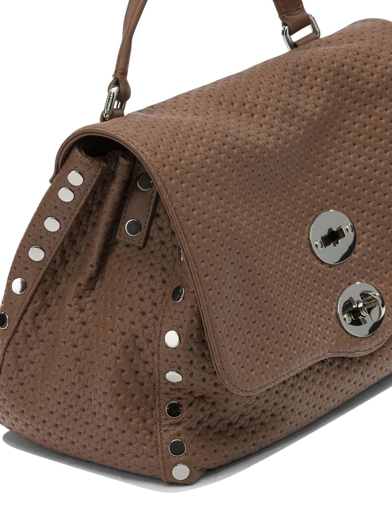 brown leather handbag by Selfnex