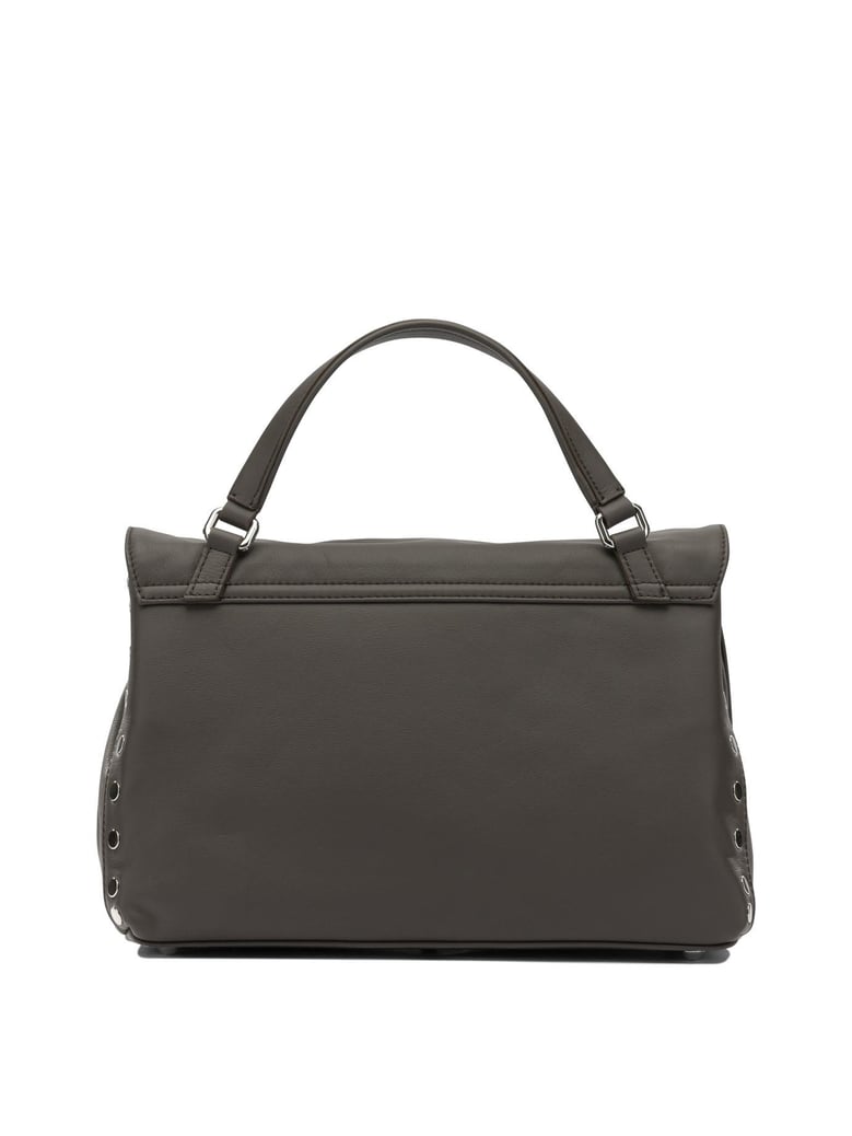 brown leather handbag by Selfnex