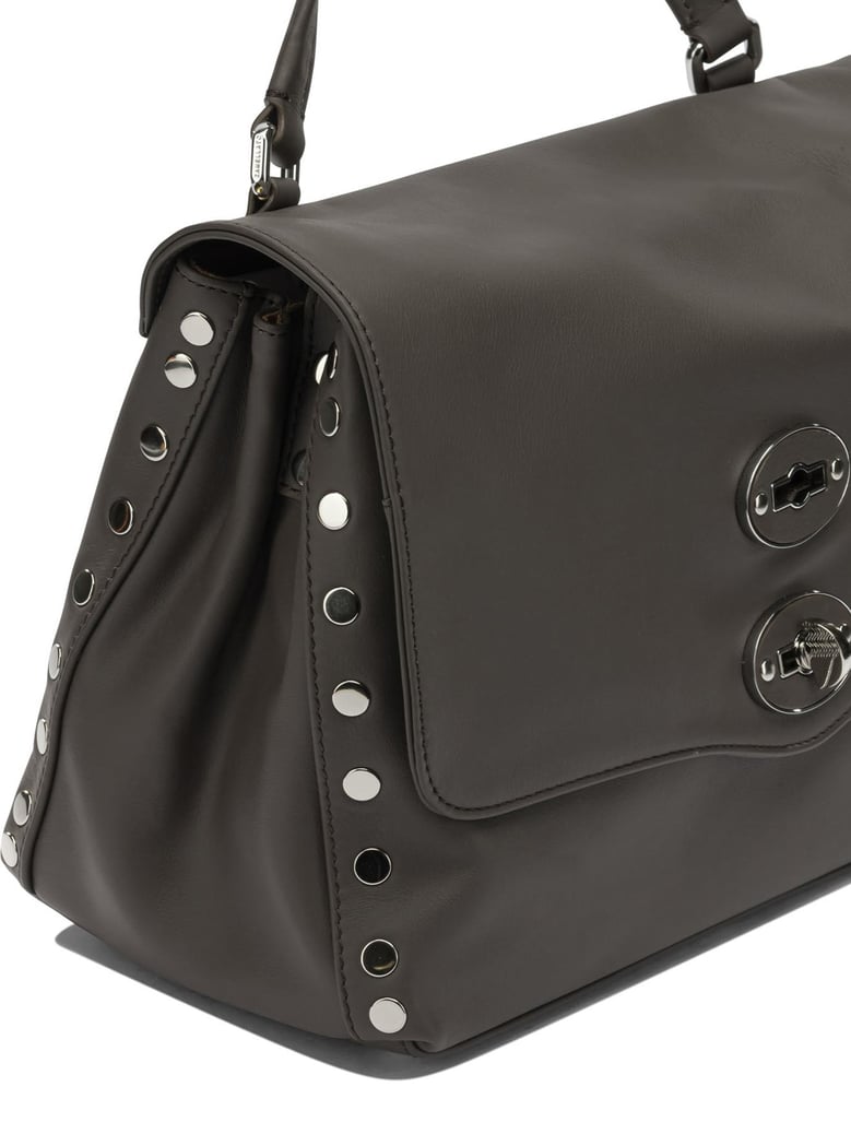 brown leather handbag by Selfnex