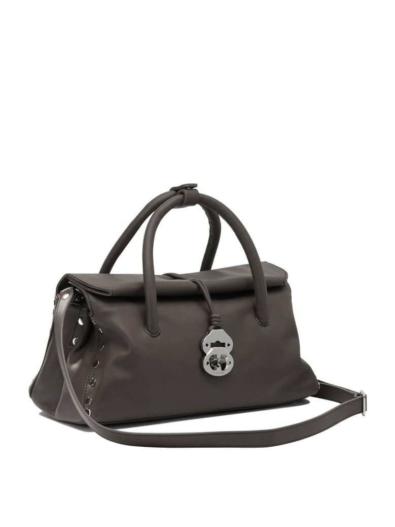 brown leather handbag by Selfnex