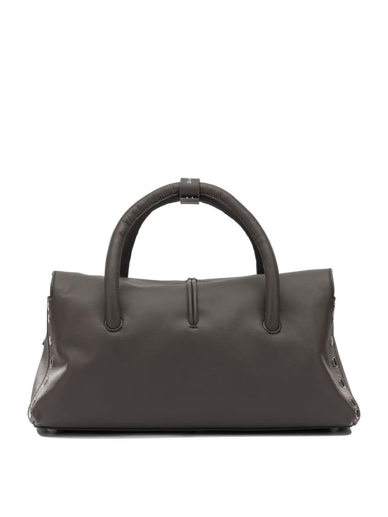 brown leather handbag by Selfnex