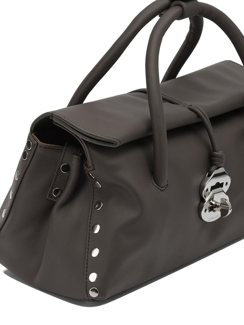 brown leather handbag by Selfnex