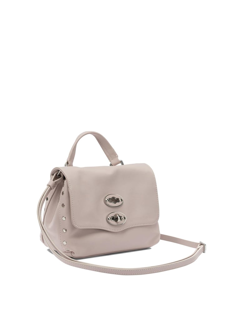 pink leather handbag by Selfnex