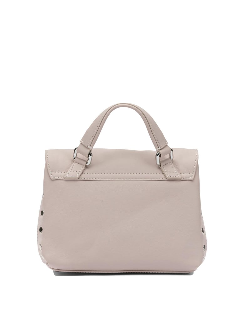 pink leather handbag by Selfnex