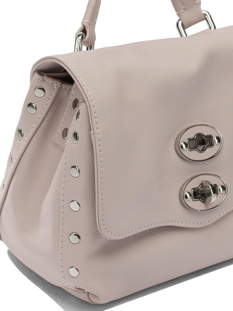 pink leather handbag by Selfnex