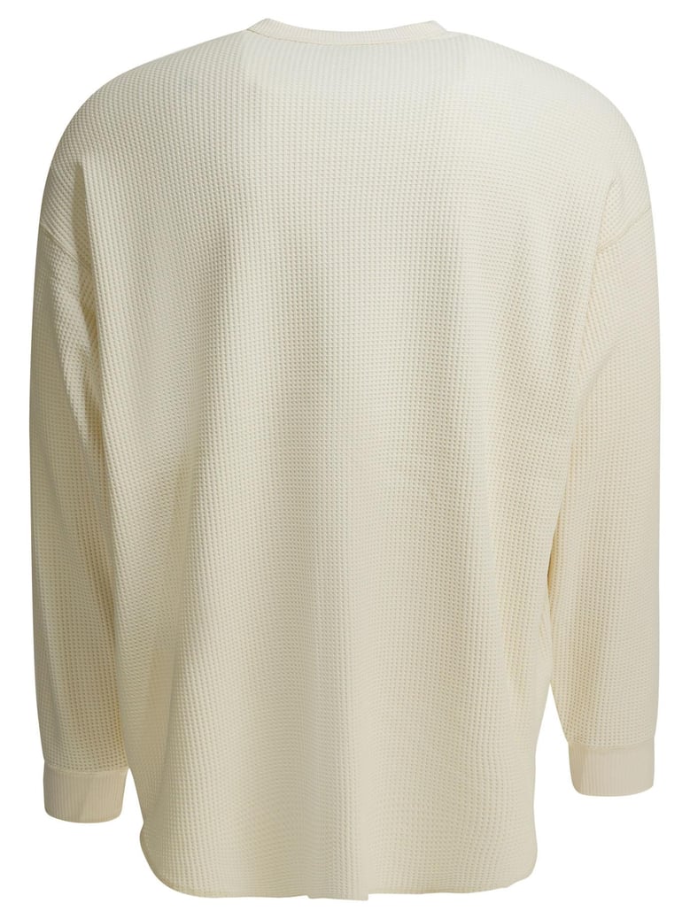 beige polyester t-shirt by Selfnex