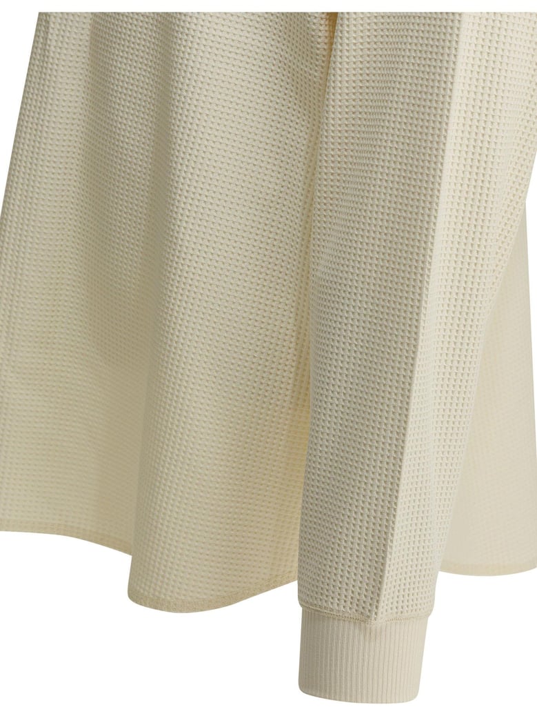 beige polyester t-shirt by Selfnex