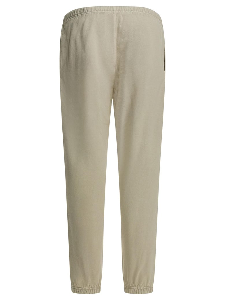 beige cotton trousers by Selfnex