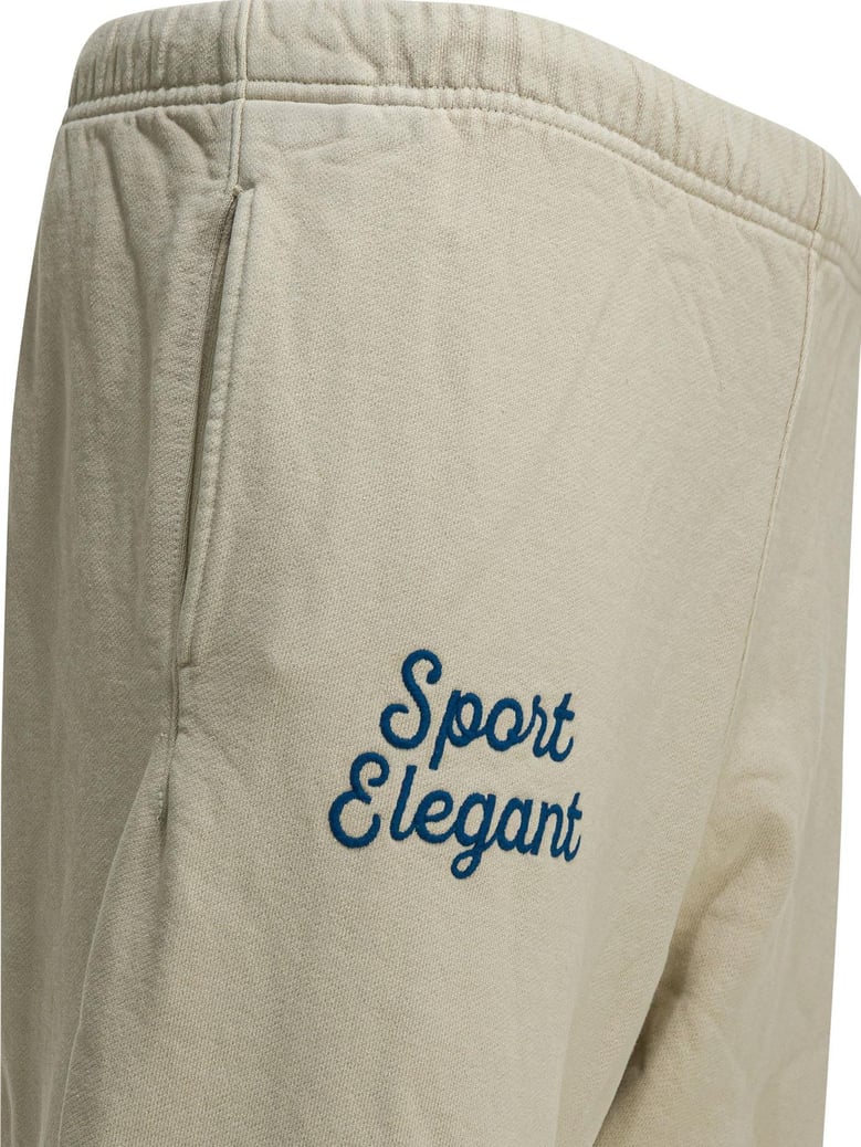 beige cotton trousers by Selfnex