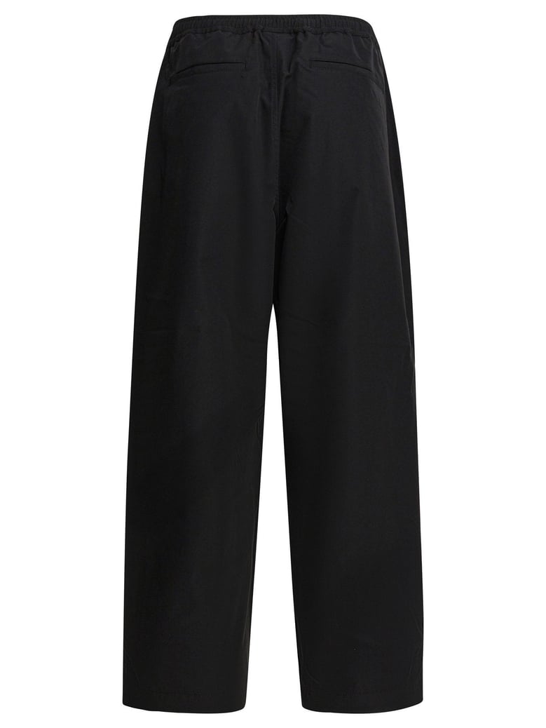 black polyester trousers by Selfnex