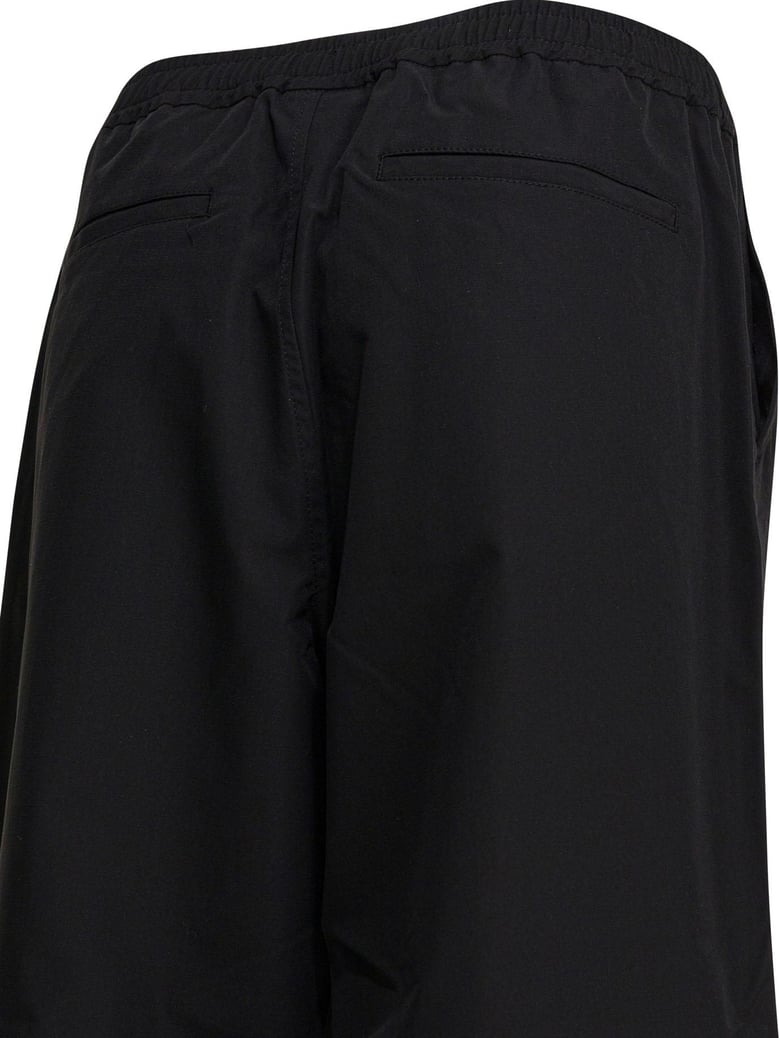 black polyester trousers by Selfnex