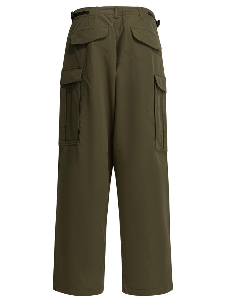 green polyester trousers by Selfnex