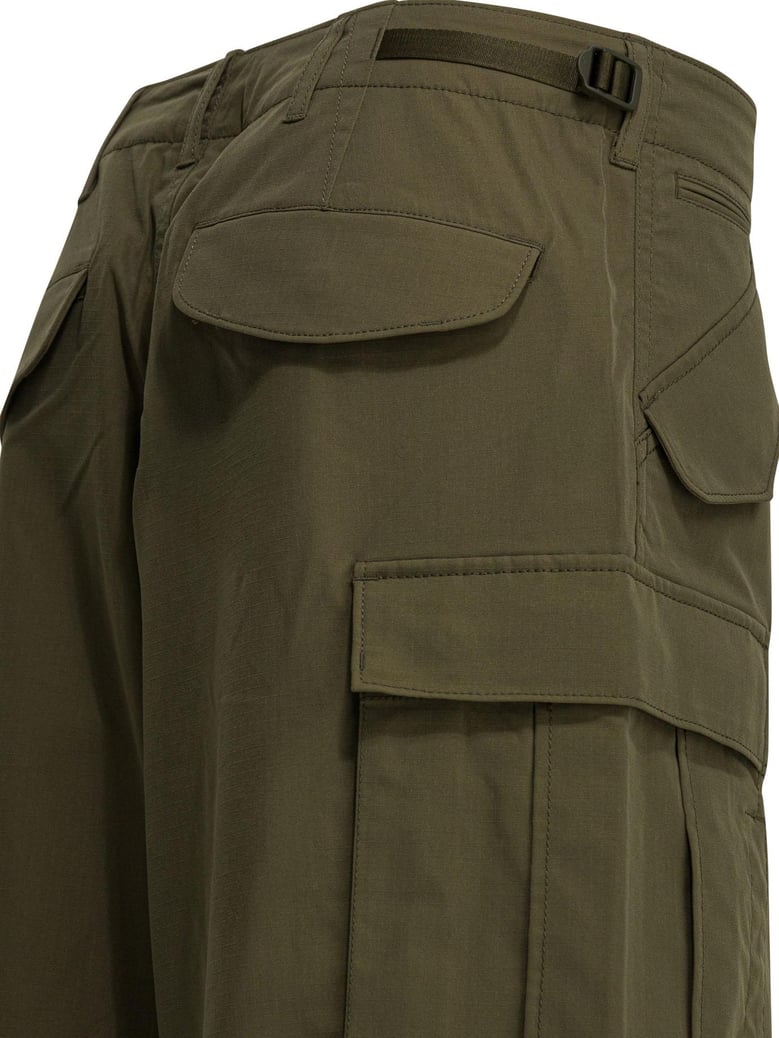 green polyester trousers by Selfnex