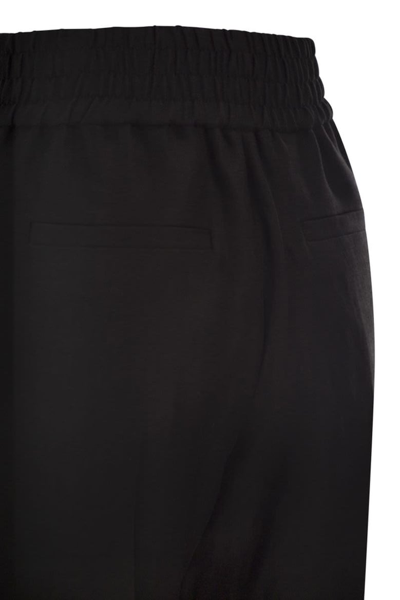 baggy pull-up trousers in viscose and linen fluid twill by Selfnex