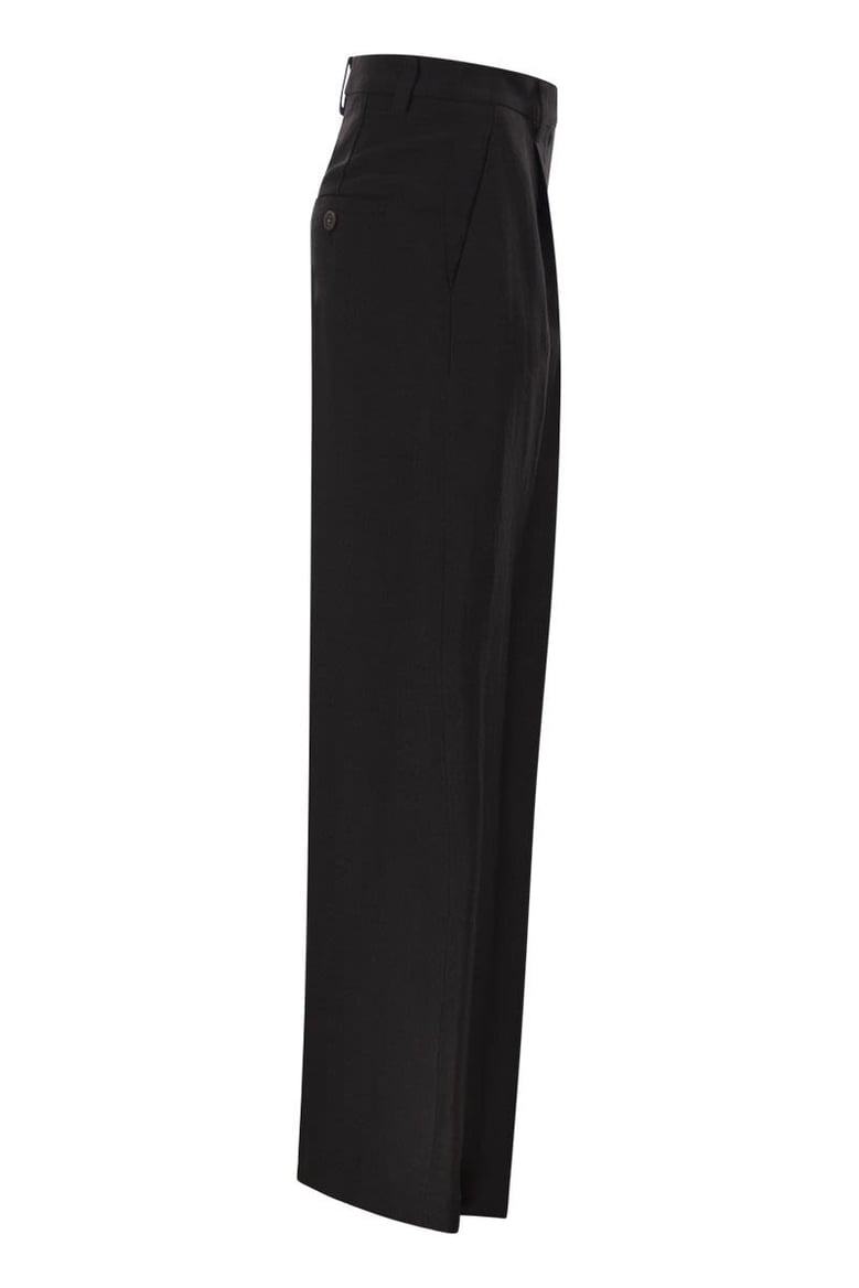 tailored trousers in fluid viscose and linen twill with double pleats by Selfnex