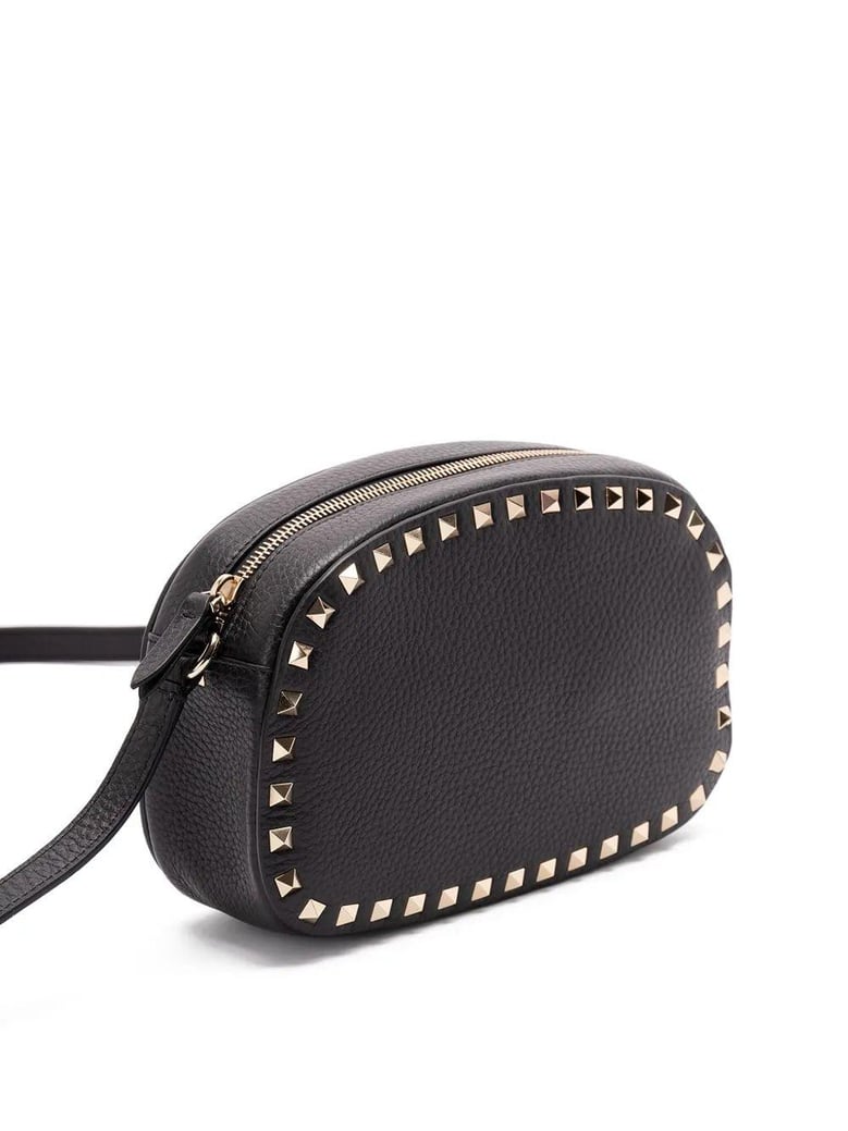 rockstud-embellished cross body bag by Selfnex