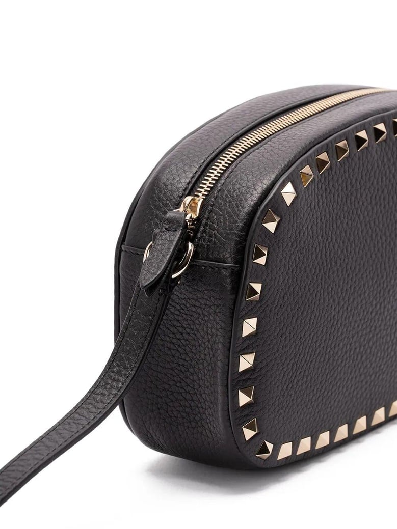 rockstud-embellished cross body bag by Selfnex