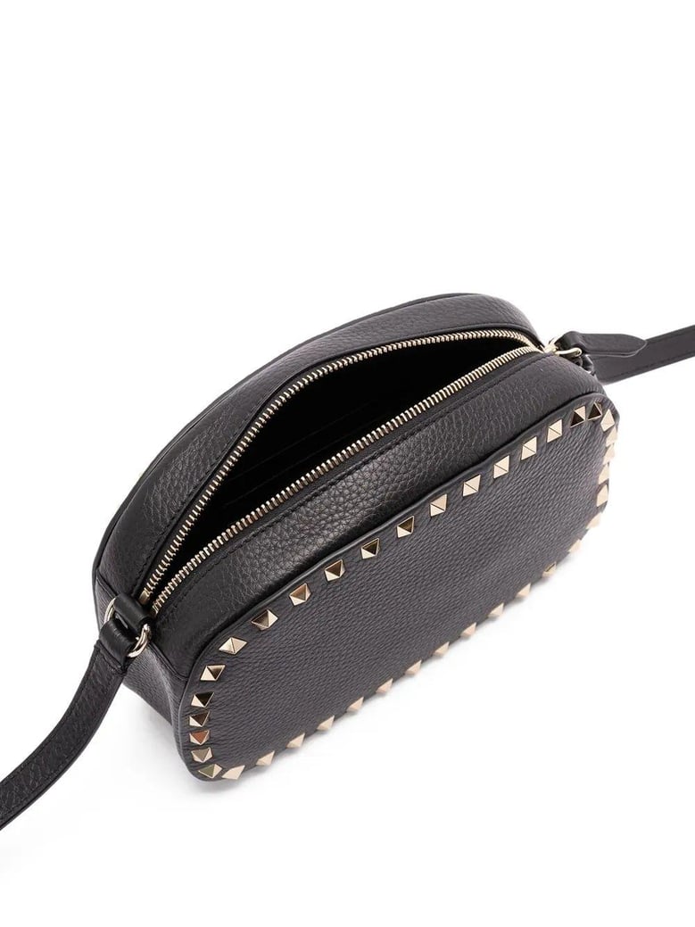 rockstud-embellished cross body bag by Selfnex