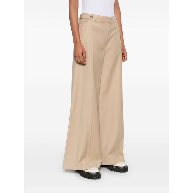 sand beige flared pants by Selfnex