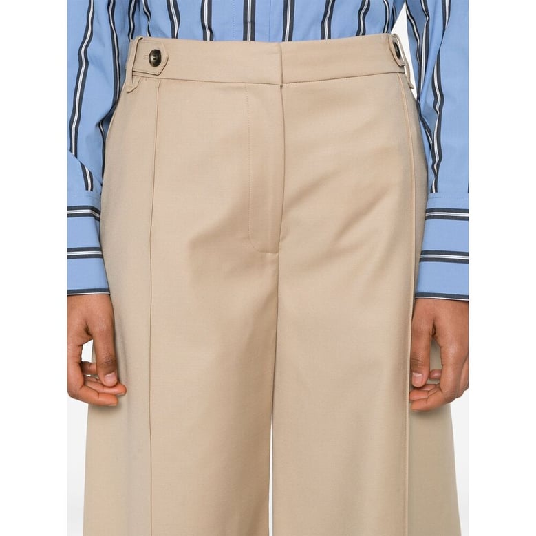 sand beige flared pants by Selfnex