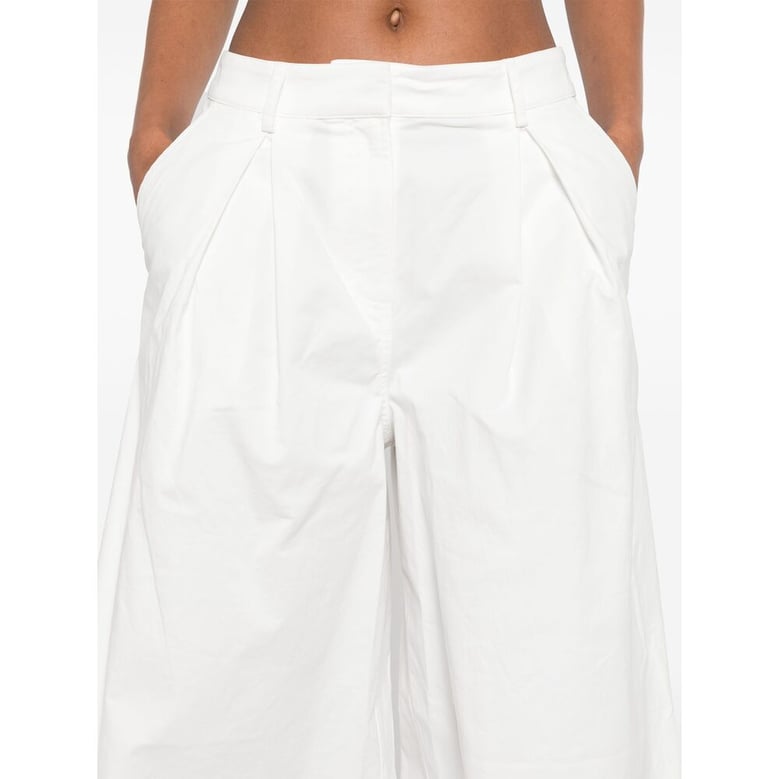 white concealed front button trousers by Selfnex