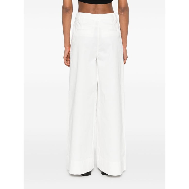 white concealed front button trousers by Selfnex