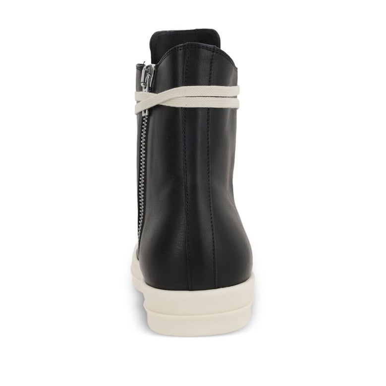 black lace-up trainers by Selfnex