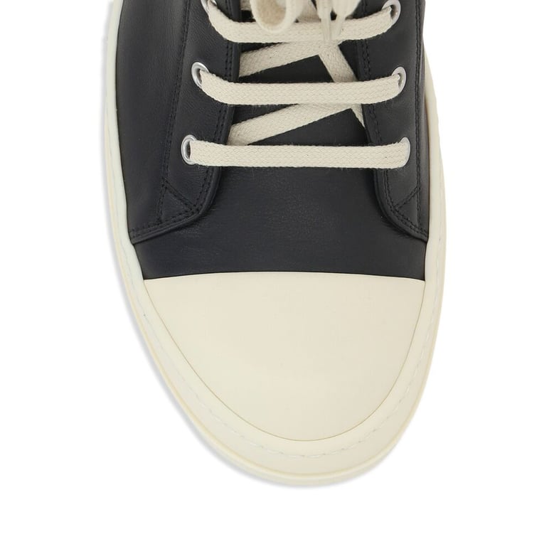 black lace-up trainers by Selfnex
