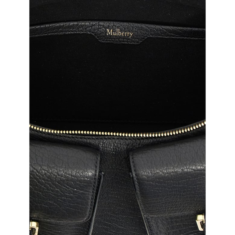 black shoulder bag with gold-tone hardware by Selfnex