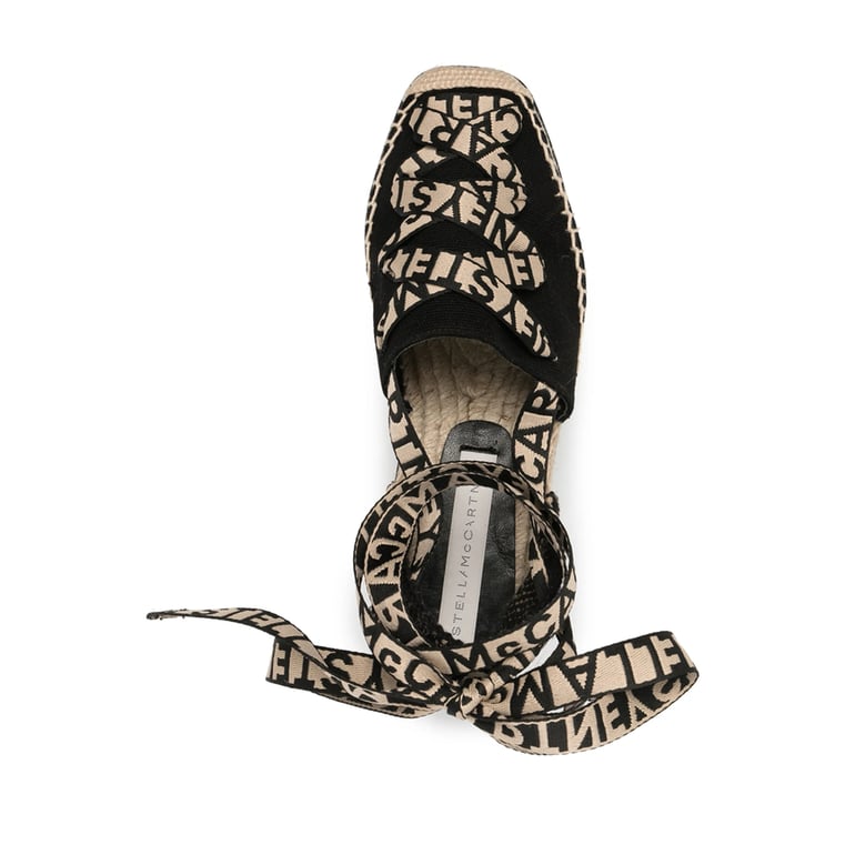 black canvas slip-on espadrilles by Selfnex